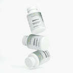 Three bottles of VitalGlow Balance+ supplement on a white background