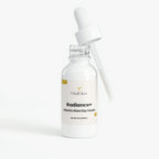 Vital Glow Radiance+ Vitamin Glow Day Serum bottle with dropper on a white background