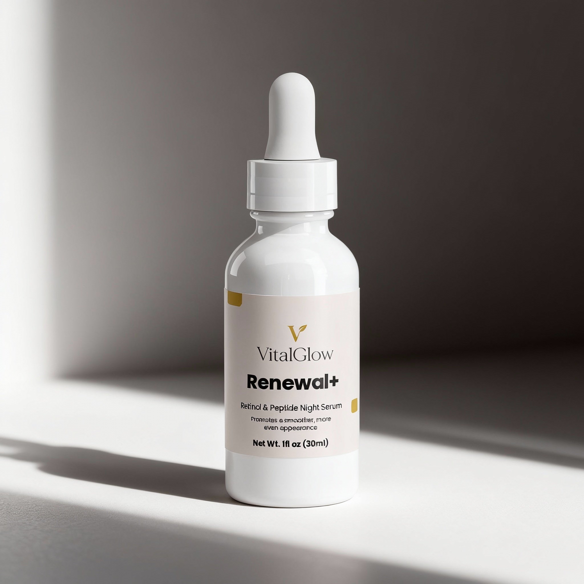 Vital Glow Renewal+ serum bottle with dropper on a gray background